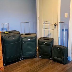 Set of 4 green Samsonite luggage
